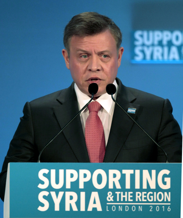 His Majesty King Abdullah delivers an address at the 'Supporting Syria and the Region Conference' in London on Thursday (Photo courtesy of Royal Court)